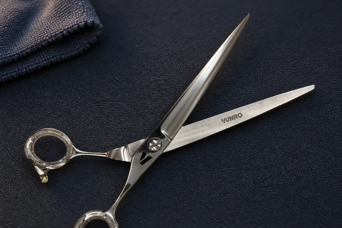 Close view of original VUNRO Precision Straight Scissors and their pivot on a clean maintenance mat